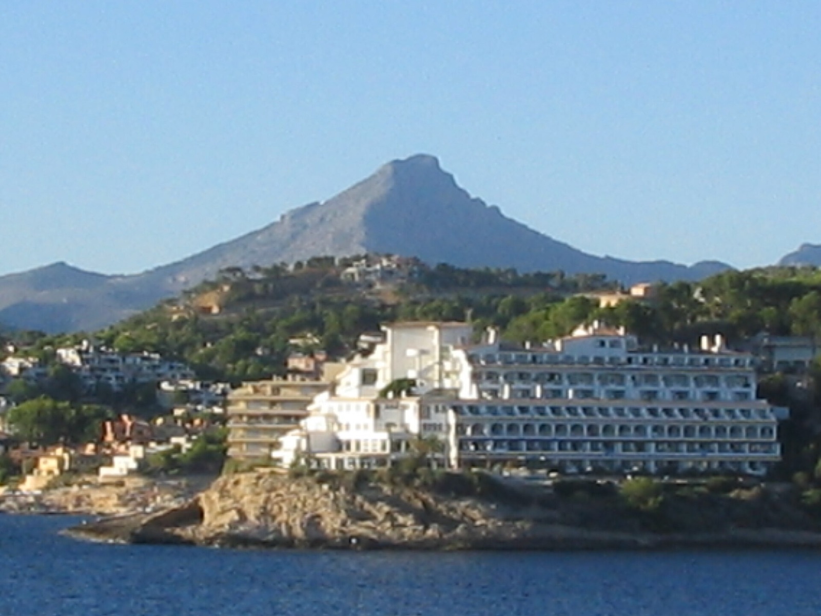 The bay of Santa Ponsa, with the headland and the mountains behind