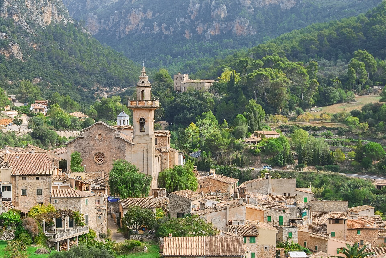 Valldemossa village and its church tower below the mountains